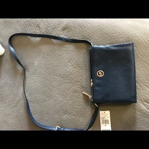 Brand New Navy  MK crossbody with tags .